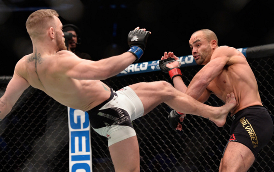 conor-mcgregor-kicks-eddie-alvarez-at-ufc-205